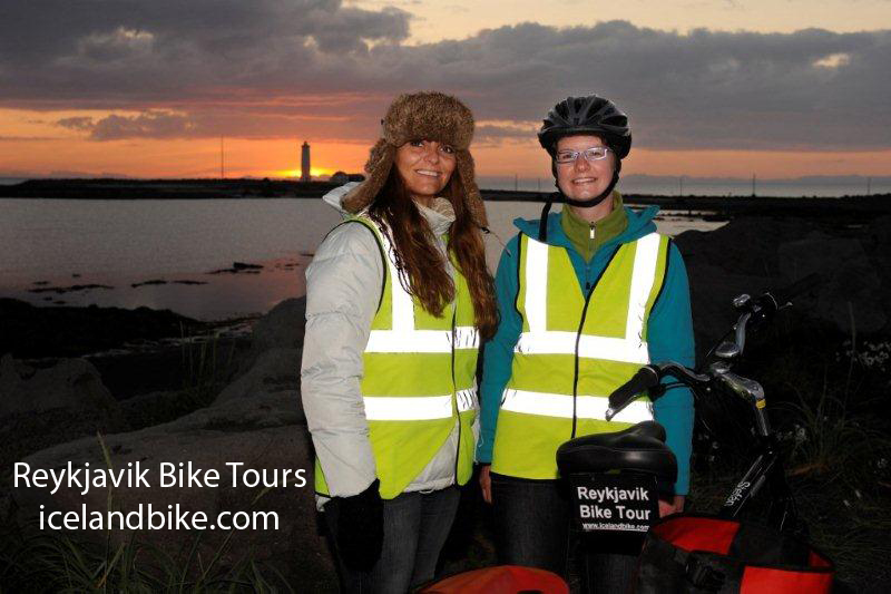 Coast at Midnight Reykjavik Bike Tours Grotta lighthouse in the midnight sun